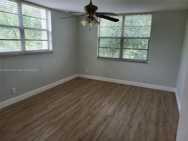 3150 W Rolling Hills Cir Unit 310, Davie, FL 33328 - empty room featuring a ceiling fan, dark wood-style flooring, and a textured ceiling