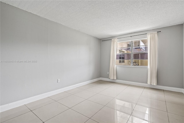 301 NW 177th St Unit 104, Miami Gardens, FL 33169 - unfurnished room with a textured ceiling and light tile patterned floors