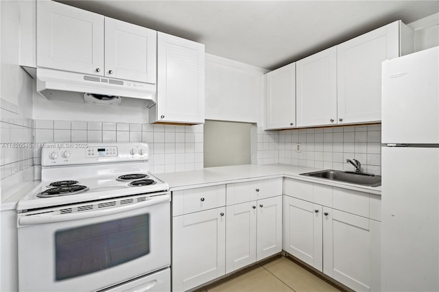 301 NW 177th St Unit 104, Miami Gardens, FL 33169 - kitchen featuring white appliances, under cabinet range hood, light countertops, and decorative backsplash