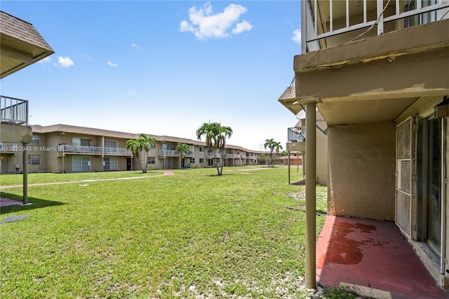 301 NW 177th St Unit 104, Miami Gardens, FL 33169 - view of grassy yard featuring a residential view