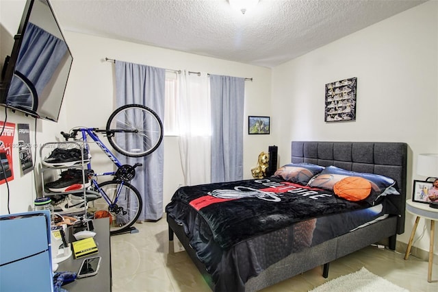 8095 NW 8th St Unit 209, Miami, FL 33126 - bedroom with a textured ceiling