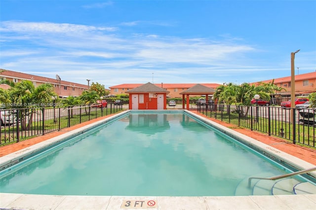 8095 NW 8th St Unit 209, Miami, FL 33126 - community pool featuring a gazebo and a residential view