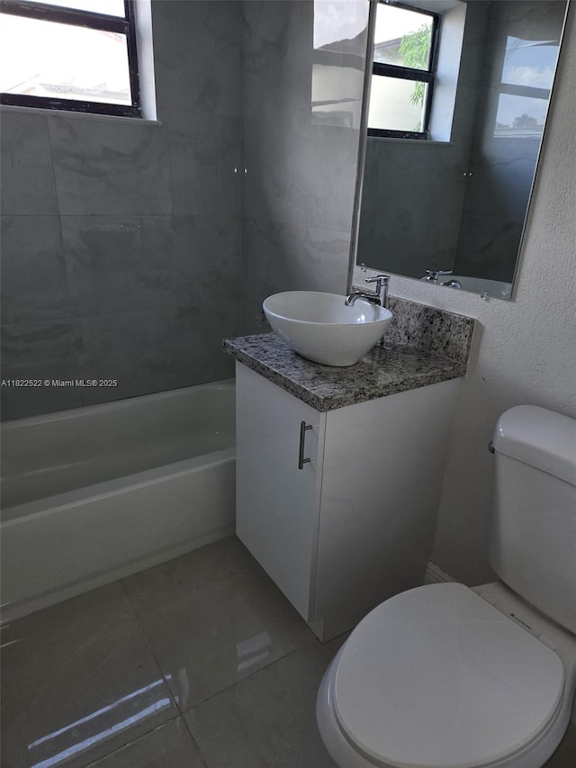 257 E 38th St, Hialeah, FL 33013 - full bath with vanity,  shower combination, and tile patterned flooring