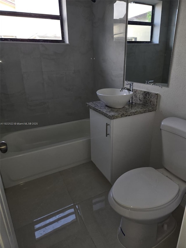 257 E 38th St, Hialeah, FL 33013 - full bathroom with vanity, shower / bathtub combination, and tile patterned flooring