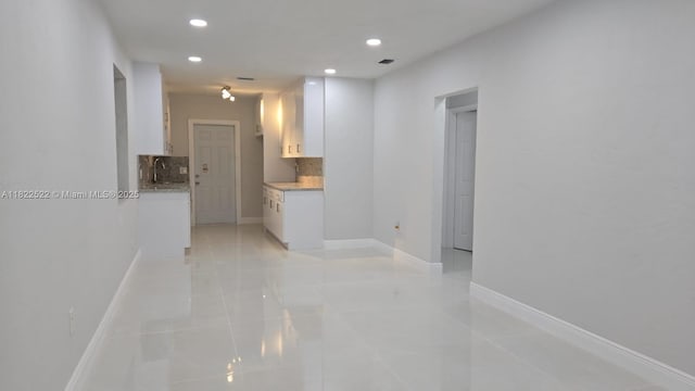 257 E 38th St, Hialeah, FL 33013 - spare room with recessed lighting and light tile patterned flooring