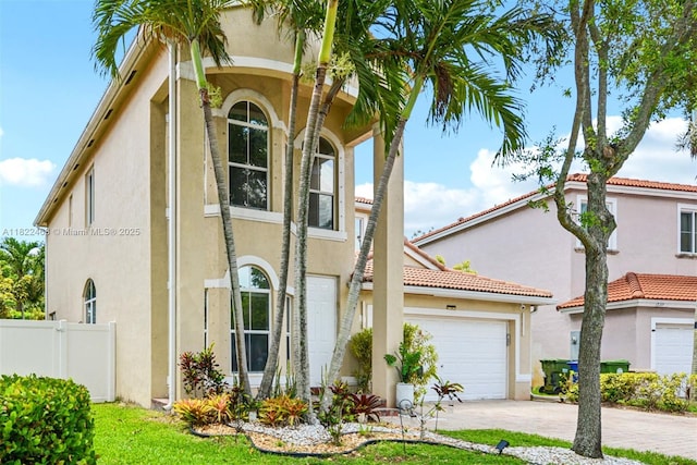 1745 NW 77th Ave, Pembroke Pines, FL 33024 - view of front of property featuring stucco siding, driveway, and an attached garage