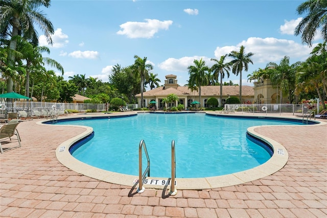 1745 NW 77th Ave, Pembroke Pines, FL 33024 - community pool featuring a patio