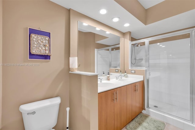 17100 N Bay Rd Unit 1904, Sunny Isles Beach, FL 33160 - full bathroom featuring double vanity, a stall shower, and recessed lighting
