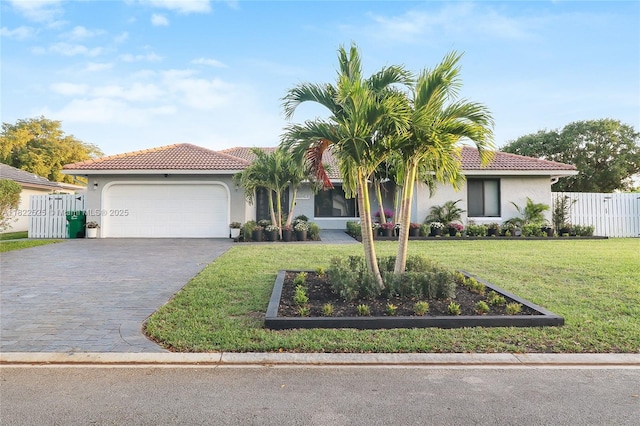 11044 NW 19th Mnr, Coral Springs, FL 33071 - view of front of home with stucco siding, a garage, decorative driveway, and a tile roof