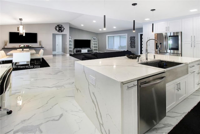 11044 NW 19th Mnr, Coral Springs, FL 33071 - kitchen with stainless steel appliances, light marble finish flooring, recessed lighting, open floor plan, and lofted ceiling