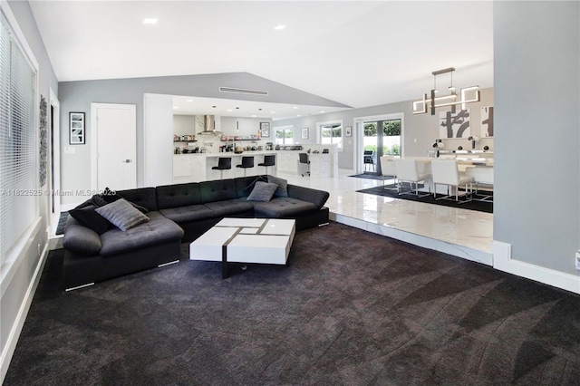 11044 NW 19th Mnr, Coral Springs, FL 33071 - living room featuring carpet, vaulted ceiling, and recessed lighting