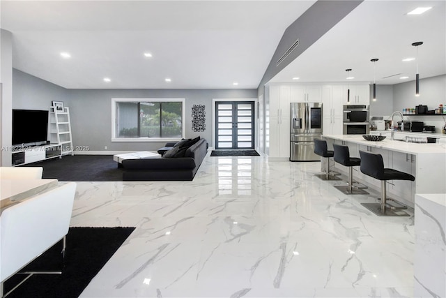 11044 NW 19th Mnr, Coral Springs, FL 33071 - living area with recessed lighting and light marble finish floors