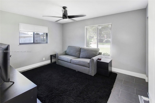 11044 NW 19th Mnr, Coral Springs, FL 33071 - living area with plenty of natural light and a ceiling fan