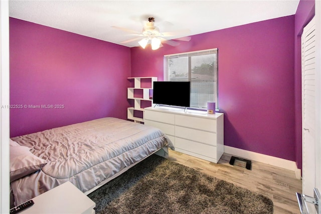11044 NW 19th Mnr, Coral Springs, FL 33071 - bedroom featuring wood finished floors and ceiling fan