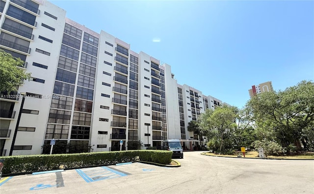 16909 N Bay Rd Unit 116, Sunny Isles Beach, FL 33160 - view of apartment building / complex featuring uncovered parking