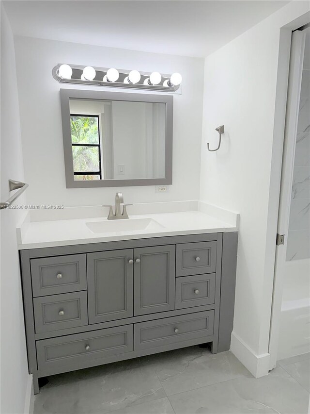 16909 N Bay Rd Unit 116, Sunny Isles Beach, FL 33160 - bathroom featuring marble finish floors and vanity