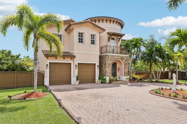 13006 SW 196th St, Miami, FL 33177 - mediterranean / spanish-style home with a balcony, decorative driveway, a tiled roof, and stucco siding