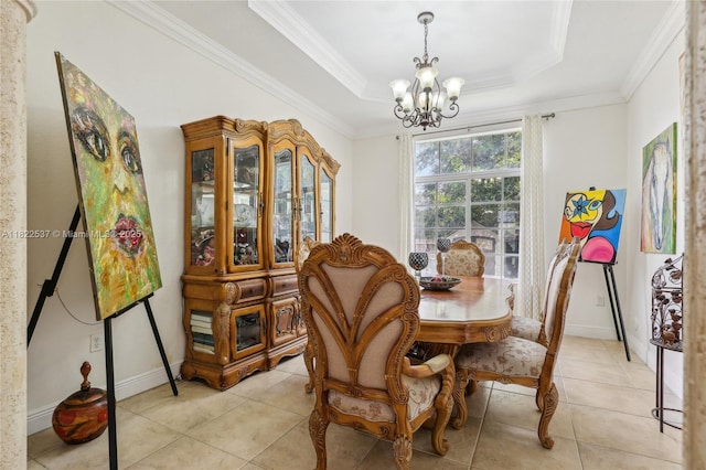13006 SW 196th St, Miami, FL 33177 - dining area with a chandelier, light tile patterned floors, ornamental molding, and a tray ceiling