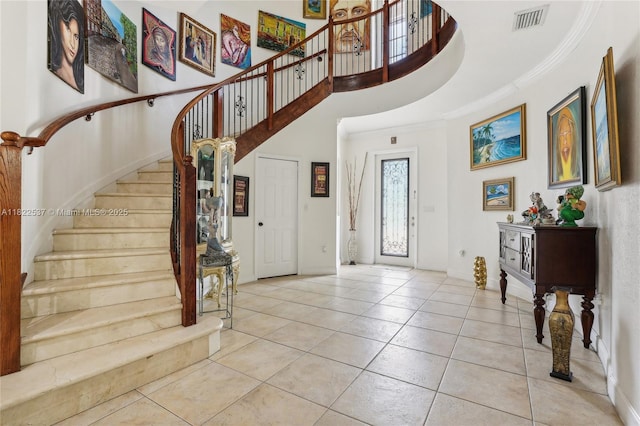 13006 SW 196th St, Miami, FL 33177 - tiled foyer featuring ornamental molding, stairway, and a high ceiling