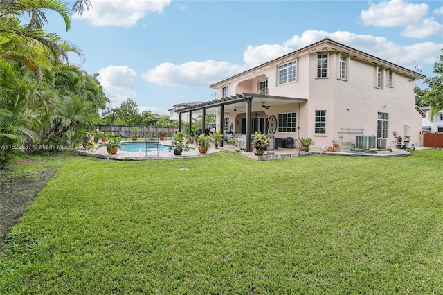 13006 SW 196th St, Miami, FL 33177 - rear view of property with a ceiling fan, stucco siding, a patio, and a fenced backyard