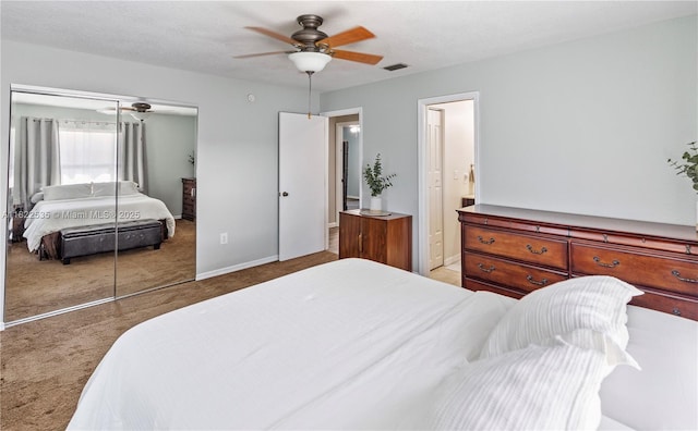 1712 Melvin Ave, Orlando, FL 32806 - bedroom with a closet, carpet floors, and a ceiling fan
