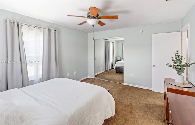 1712 Melvin Ave, Orlando, FL 32806 - carpeted bedroom featuring multiple windows, a closet, and ceiling fan