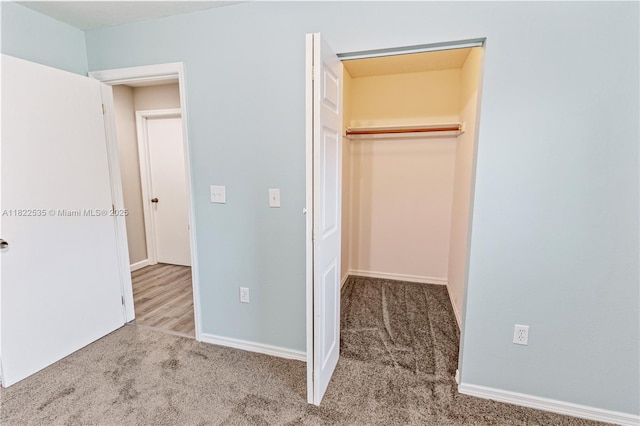 1712 Melvin Ave, Orlando, FL 32806 - unfurnished bedroom with carpet floors, a closet, and a spacious closet