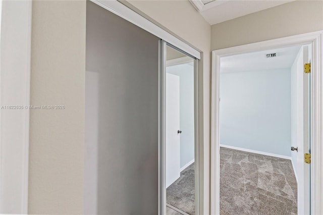 1712 Melvin Ave, Orlando, FL 32806 - hall featuring carpet flooring and baseboards