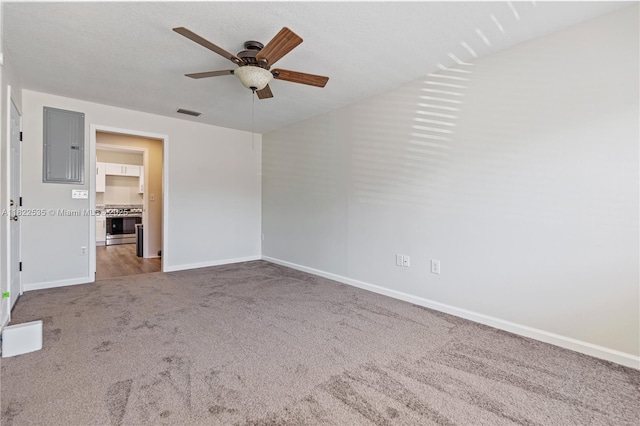 1712 Melvin Ave, Orlando, FL 32806 - spare room with carpet floors, a ceiling fan, and electric panel