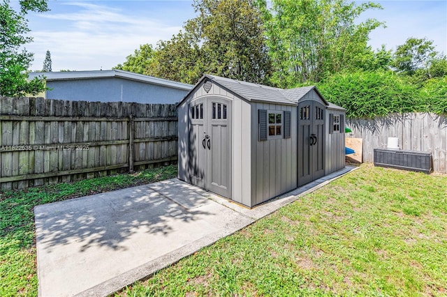 1712 Melvin Ave, Orlando, FL 32806 - view of shed with a fenced backyard