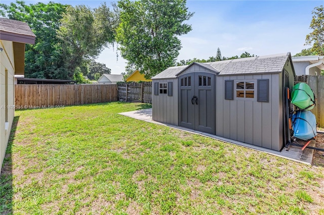 1712 Melvin Ave, Orlando, FL 32806 - fenced backyard with a storage shed