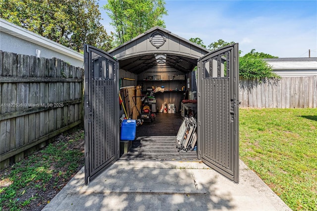 1712 Melvin Ave, Orlando, FL 32806 - view of shed with a fenced backyard