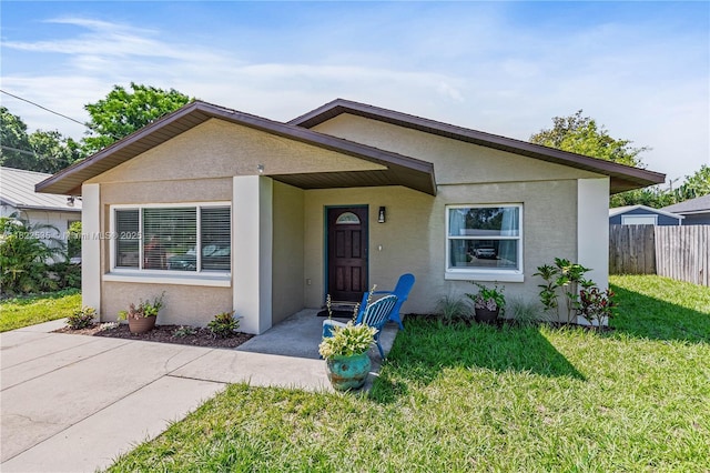 1712 Melvin Ave, Orlando, FL 32806 - bungalow with stucco siding