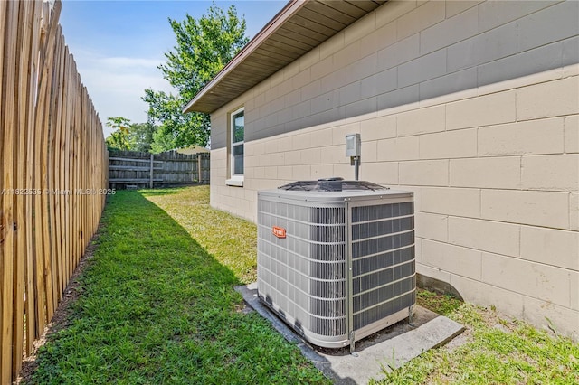 1712 Melvin Ave, Orlando, FL 32806 - exterior view of a cooling unit and concrete block siding