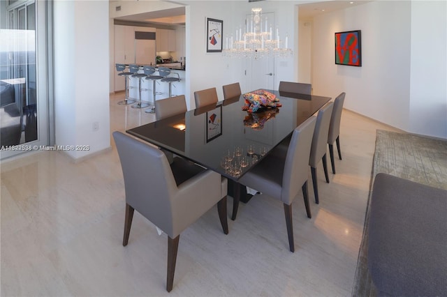 1425 Brickell Ave Unit 48C, Miami, FL 33131 - dining space with a chandelier