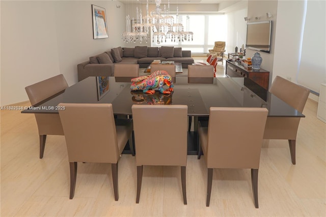 1425 Brickell Ave Unit 48C, Miami, FL 33131 - dining area featuring a chandelier