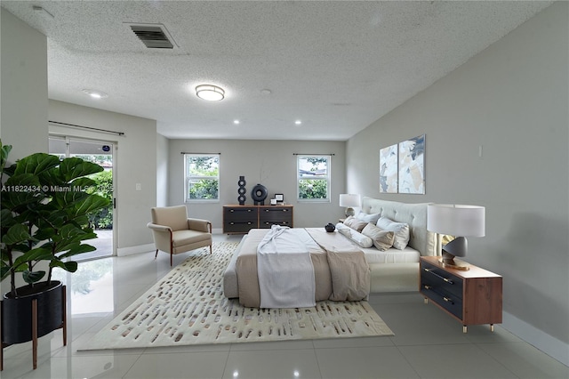 9408 SW 156th Pl, Miami, FL 33196 - bedroom with access to exterior and a textured ceiling