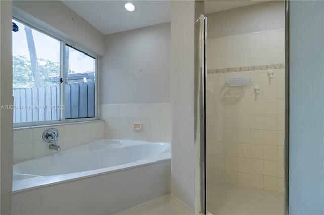 9408 SW 156th Pl, Miami, FL 33196 - bathroom featuring a bath and a stall shower