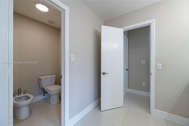 9408 SW 156th Pl, Miami, FL 33196 - bathroom with a bidet and tile patterned flooring