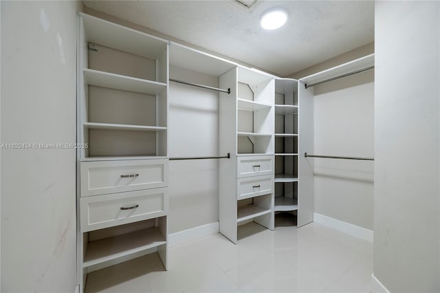 9408 SW 156th Pl, Miami, FL 33196 - spacious closet with light tile patterned floors