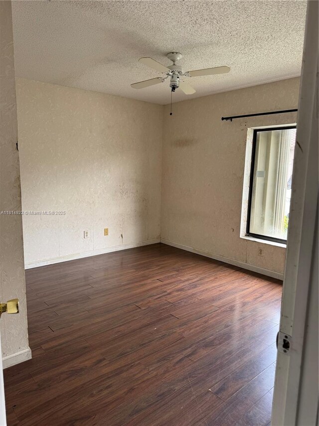 3313 W Inverrary Blvd W, Lauderhill, FL 33319 - empty room with wood finished floors, a textured wall, ceiling fan, and a textured ceiling