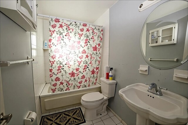 22115 SW 58th Ave, Boca Raton, FL 33428 - bathroom with tile patterned floors and shower / bath combo with shower curtain