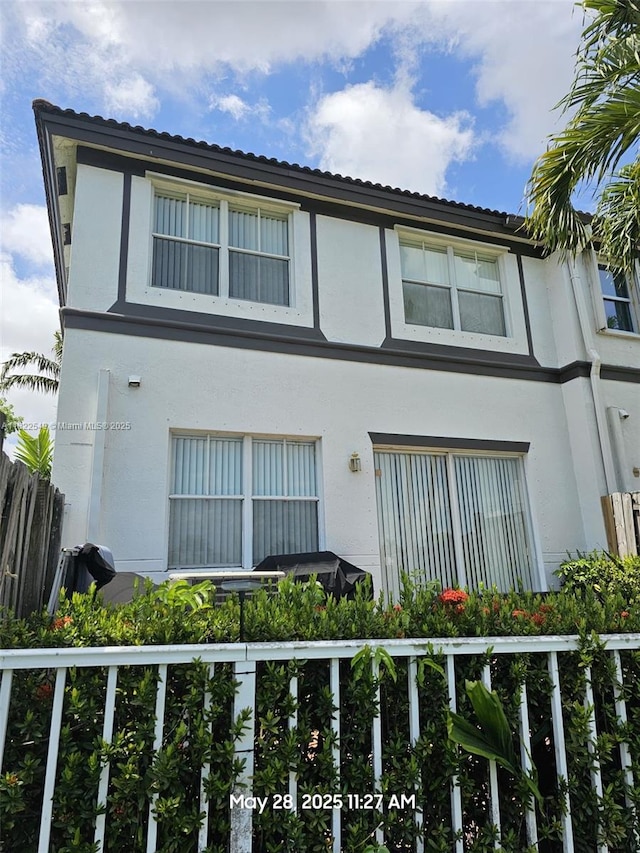 11401 NW 76th Ter, Doral, FL 33178 - back of house featuring stucco siding