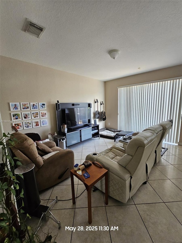 11401 NW 76th Ter, Doral, FL 33178 - living room with light tile patterned floors and a textured ceiling
