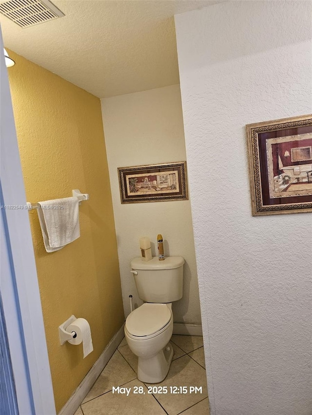 11401 NW 76th Ter, Doral, FL 33178 - bathroom featuring tile patterned flooring, a textured ceiling, and a textured wall