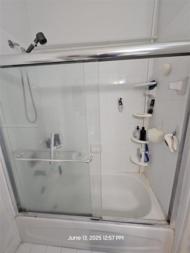 11401 NW 76th Ter, Doral, FL 33178 - bathroom with combined bath / shower with glass door
