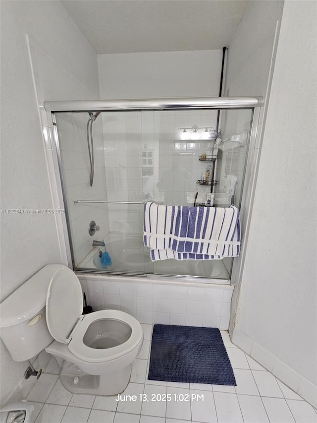11401 NW 76th Ter, Doral, FL 33178 - full bath with tiled shower / bath combo and tile patterned flooring