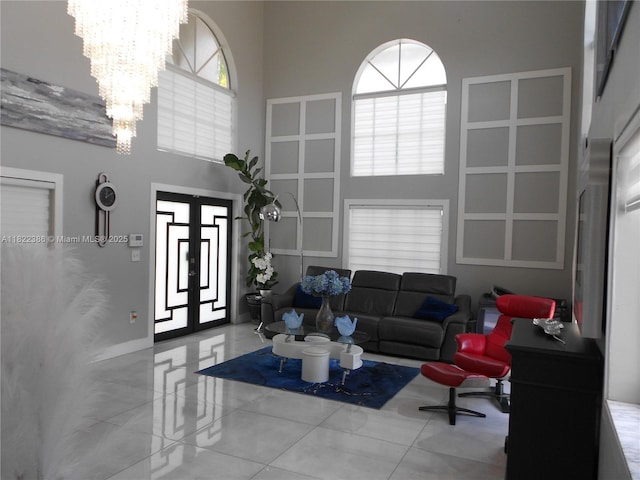 12940 SW 142nd Ter, Miami, FL 33186 - living area with a towering ceiling and a chandelier