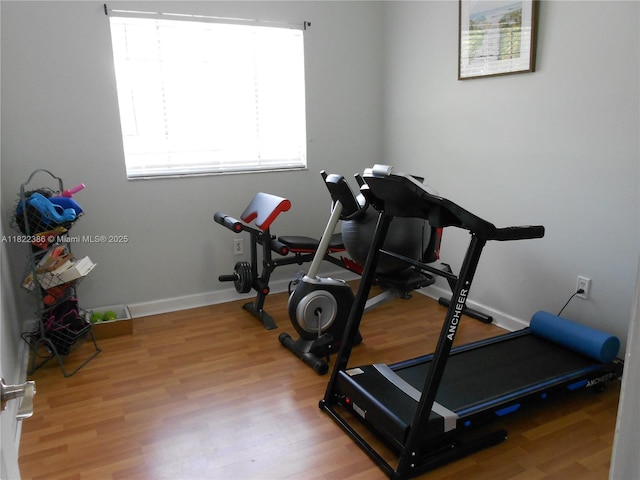 12940 SW 142nd Ter, Miami, FL 33186 - exercise area with wood finished floors and baseboards