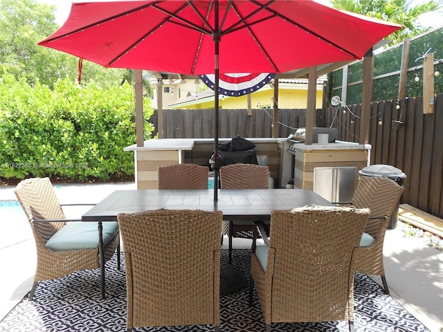 12940 SW 142nd Ter, Miami, FL 33186 - view of patio / terrace featuring outdoor dining area